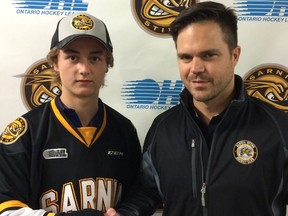 The Sarnia Sting have signed forward Brady Hinz, left, for the upcoming season. Sting general manager Nick Sinclair, right, selected the 16-year-old Stratford native in the third round of this year's Ontario Hockey League draft out of the Huron-Perth Lakers organization. Handout/Sarnia Observer/Postmedia Network
