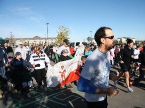 Runners take off during the 2015 Terry Fox Run in Spruce Grove. The organizer hopes this year’s participation and funds raised will be even higher than last year’s. - File photo