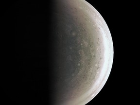 This Aug. 27, 2016 image provided by NASA provides a new perspective on Jupiter's south pole, seen when the Juno spacecraft was about 58,700 miles (94,500 kilometers) away. Unlike the equatorial region's familiar structure of belts and zones, the poles are mottled by clockwise and counterclockwise rotating storms of various sizes, similar to giant versions of hurricanes on Earth. (NASA/JPL-Caltech/SwRI/MSSS via AP)