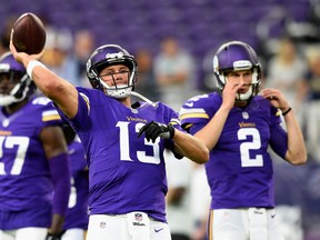 You will see a lot of Vikings quarterback Shaun Hill handing off to running back Adrian Peterson this season. (Getty Images)