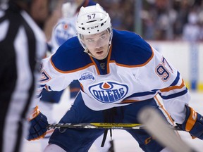 Edmonton Oilers centre Connor McDavid lines up for a faceoff during a game in Vancouver Saturday April 9, 2016. (THE CANADIAN PRESS/Darryl Dyck)