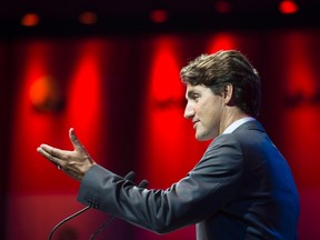 Canadian Prime Minister Justin Trudeau gestures as he delivers a speech to the Canadian China Business Council in Shanghai, Thursday September 1, 2016. THE CANADIAN PRESS/Adrian Wyld