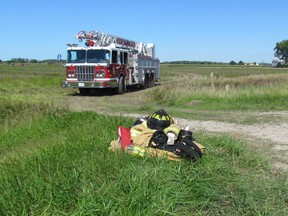A fire truck leaves a field on the north side of London Line on Saturday September 3, 2016 in Sarnia, Ont. A man died Saturday when a  small airplane he was the lone occupant of crash near the 2300 block of London Line, at approximately 11:45 a.m.
Paul Morden/Sarnia Observer/Postmedia Network