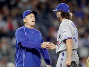 Manager John Gibbons of the Toronto Blue Jays pulls R.A. Dickey from the game against the New York Yankees at Yankee Stadium on May 24, 2016. (Elsa/Getty Images)