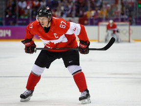 Canada’s Sidney Crosby waits for a face-off against Sweden during the gold medal hockey game at the 2014 Winter Olympics Sunday, Feb. 23, 2014, in Sochi, Russia. (THE CANADIAN PRESS/ AP/Matt Slocum)