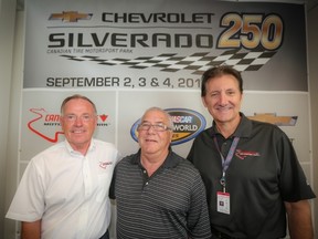 Longtime Toronto Sun motorsports writer Dean McNulty (middle), flanked by Myles Brandt (president and GM of CTMP) and Ron Fellows, has been named Grand Marshal for the Chevrolet Silverado 250 on Sunday. (JOHN WALKER photo)