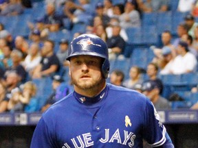 Blue Jays' Josh Donaldson  jogs back to the dugout after scoring the team's first run in the first inning against the Tampa Bay Rays at Tropicana Field on Saturday in St. Petersburg. (GETTY IMAGES/PHOTO)