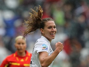 Lauren Cheney Holiday of USA celebrates after scoring her team's first goal during the FIFA Women's World Cup 2011 Semi Final match between France and USA at Borussia-Park on July 13, 2011 in Moenchengladbach, Germany. (Boris Streubel/Getty)