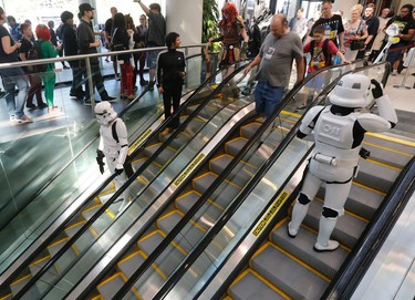 Storm troopers heading up and down the escalators on the final day of Fan Expo Canada at the Metro Toronto Convention Centre Sunday September 4, 2016. Michael Peake/Toronto Sun/Postmedia Network