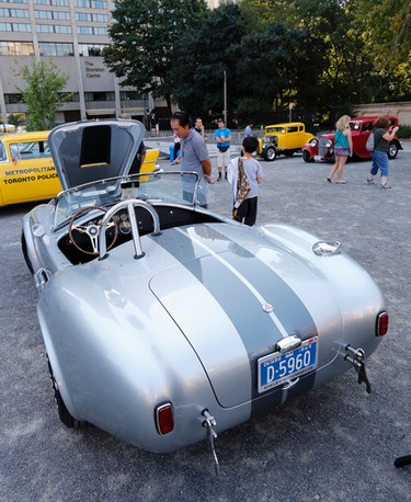 A replica of a 1965 Shelby Cobra at the Ontario Auto Museum's first outdoor show at Toronto City Hall on Sunday September 4, 2016. Michael Peake/Toronto Sun/Postmedia Network