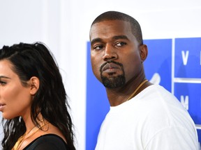 Kim Kardashian West and Kanye West attend the 2016 MTV Video Music Awards at Madison Square Garden on August 28, 2016 in New York City. (Photo by Larry Busacca/Getty Images)