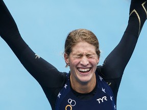 USA's Summer Cook finishes first during the Elite Women's race at the ITU World Triathlon Edmonton at Hawrelak Park in Edmonton, Alta., on Sunday, Sept. 4, 2016.