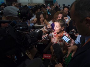 International Trade Minister Chrystia Freeland speaks with Canadian and International reporters at the G20 Leaders Summit in Hangzhou, China, on Monday, September 5, 2016. THE CANADIAN PRESS/Adrian Wyld