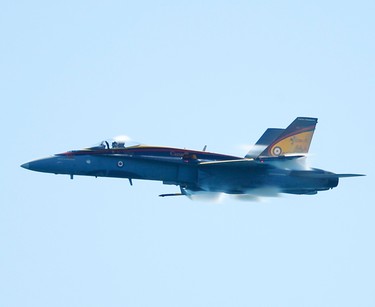The Canadian Forces CF-18 Hornet performs at the 67th annual Canadian International Air Show (CIAS) soared over Lake Ontario and the CNE on the Labour Day weekend.  Sunday September 4, 2016. Jack Boland/Toronto Sun/Postmedia Network