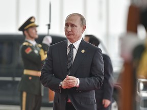 Russia President Vladimir Putin (C) of Russia arrives at the Hangzhou Exhibition Center to participate in G20 Summit, on September 4, 2016 in Hangzhou, China.  (Etienne Oliveau/Getty Images)
