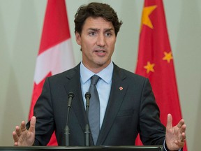 Prime Minister Justin Trudeau speaks with the media following the G20 Leaders Summit in Hangzhou, Monday, Sept. 5, 2016. THE CANADIAN PRESS/Adrian Wyld