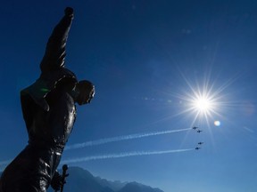 Fighter jets pass the statue of the Great Britain's band Queen's late singer Freddie Mercury on July 16, 2016 in Montreux, during the 50th edition of the Montreux Jazz Festival. The Montreux Jazz Festival runs from July 1 to July 16 and will be celebrating its 50th edition. ( FABRICE COFFRINI/AFP/Getty Images)