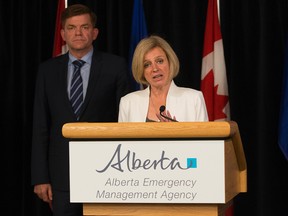 Wildrose Leader Brian Jean and Alberta Premier Rachel Notley. (Postmedia file)