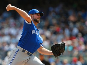 Pitcher R.A. Dickey #43 of the Toronto Blue Jays delivers a pitch in the first inning against the New York Yankees during a game at Yankee Stadium on September 5, 2016 in the Bronx borough of New York City. (Photo by Rich Schultz/Getty Images)