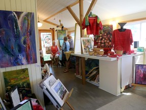 Marion Casson (back) speaks with visitors to her studio and home during of the Rednersville Road Art Tour on Monday September 5, 2016 in Prince Edward County, Ont. 


Emily Mountney-Lessard/Belleville Intelligencer/Postmedia Network