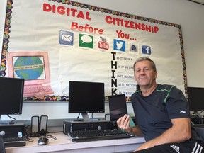 Wade Gregg, the principal at Queenston School, shows technology elementary students will have access to when they go back to school Tuesday. (DAVID LARKINS/Winnipeg Sun/Postmedia Network)