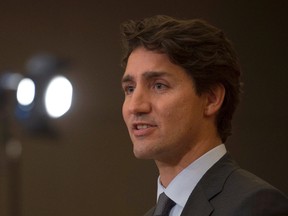 Canadian Prime Minister Justin Trudeau speaks with the media following the G20 Leaders Summit in Hangzhou, China, Monday, September 5, 2016. (THE CANADIAN PRESS/Adrian Wyld)