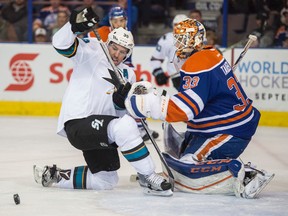 Logan Couture (left) helped the Sharks to the Stanley Cup final last spring and has established himself as one of the best two-way forwards in the NHL. (Shaughn Butts/Postmedia Network/Files)