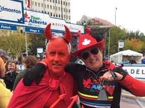 Super fans Lorna McNeil and Robert Carroll celebrate the end of the Tour of Alberta in Edmonton.