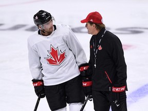 Team Canada's head coach Mike Babcock talks with John Tavares during practice in Ottawa on Monday, Sept. 5, 2016, in preparation for the World Cup of Hockey. (Sean Kilpatrick/The Canadian Press)
