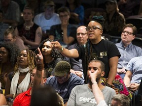 Syrus Marcus Ware, of Black Lives Matter (right), during last week's  town hall meeting on the future of Pride. (ERNEST DOROSZUK, Toronto Sun