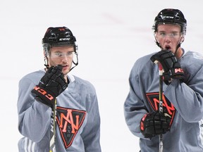 Team North America players Jonathan Drouin (left) and Connor McDavid look on during training camp in Montreal, Monday, September 5, 2016, ahead of the 2016 World Cup of Hockey. (Graham Hughes/The Canadian Press)