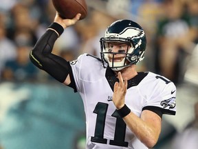 Eagles quarterback Carson Wentz will start for the Eagles against the Browns on Sunday. (Mel Evans/AP Photo/Files)