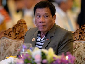 Philippine President Rodrigo Duterte attends a welcome dinner at the ASEAN Summit in Vientiane on Sept. 6, 2016. (YE AUNG THU/AFP/Getty Images)