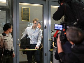 Brock Turner leaves the Santa Clara County Main Jail in San Jose, Calif., on Friday, Sept. 2, 2016. Turner, whose six-month sentence for sexually assaulting an unconscious woman at Stanford University sparked national outcry, was released from jail after serving half his term. (Dan Honda/Bay Area News Group via AP)