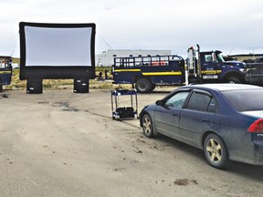 Outdoor movie screen at Fountain Tire in Drayton Valley