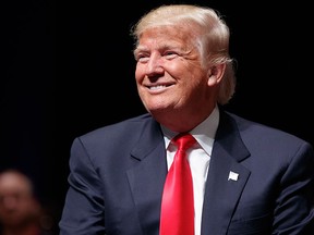 Republican presidential candidate Donald Trump smiles during a town hall, Tuesday, Sept. 6, 2016, in Virginia Beach, Va. (AP Photo/Evan Vucci)