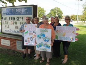 Trinity Anglican Church members hold up signs made for the church's free annual Fall Fair, which takes place on Saturday, Sept. 10 from 11 a.m. to 3 p.m.
CARL HNATYSHYN/SARNIA THIS WEEK