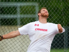 Kevin Strybosch of London will be competing in the paralympics in Rio in discus. Strybosch was practicing at Western's TD Stadium in London, Ont. on Thursday August 25, 2016. (MIKE HENSEN, The London Free Press)