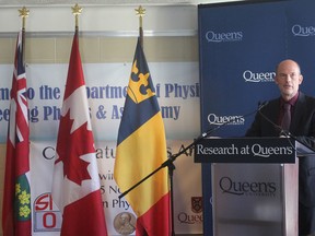 Dr. Anthony Noble, from the physics department at Queen's University, addresses a gathering on campus in Kingston, Ont. on Tuesday, Sept. 6, 2016, to announce the funding for the creation of a new research centre that will probe the origins of the universe. (Michael Lea/The Whig-Standard)