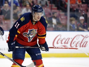 Florida Panthers centre Jonathan Huberdeau (11) gets set during a game against the Carolina Hurricanes in Sunrise, Fla., on Nov. 26, 2014. (THE CANADIAN PRESS/Lynne Sladky)