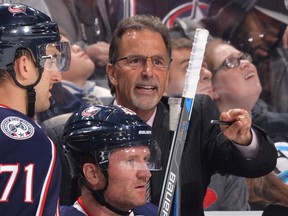 Coach John Tortorella of the Columbus Blue Jackets gives instructions to his team during a game against the Winnipeg Jets on October 31, 2015 at Nationwide Arena in Columbus. (Jamie Sabau/NHLI via Getty Images)