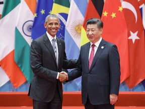 Chinese President Xi Jinping (right) shakes hands with U.S. President Barack Obama to the G20 Summit on September 4, 2016 in Hangzhou, China. (Lintao Zhang/Getty Images)