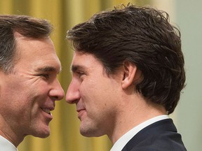Prime Minister Justin Trudeau, right, goes face-to-face with Finance Minister Bill Morneau at Rideau Hall in Ottawa in this Nov. 4, 2015 file photo. THE CANADIAN PRESS/Sean Kilpatrick