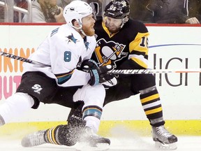 Joe Pavelski of the San Jose Sharks collides with Eric Fehr of the Pittsburgh Penguins during Game 2 of the 2016 Stanley Cup Final at Consol Energy Center in Pittsburgh. (Bruce Bennett/Getty Images)