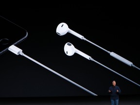 Apple senior vice president of worldwide marketing Phil Schiller introduces Lightning headphones during a launch event on September 7, 2016 in San Francisco. (Stephen Lam/Getty Images)