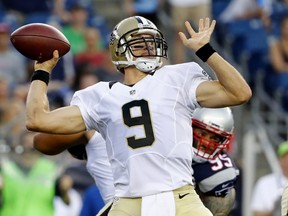 New Orleans Saints quarterback Drew Brees passes during the first half of a preseason NFL football game against the New England Patriots in Foxborough, Mass. (AP Photo/Winslow Townson, File)