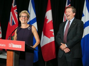 Premier Kathleen Wynne and Mayor John Tory hold a meeting and joint press conference at Queen's Park in Toronto on Sept. 7, 2016. (Veronica Henri/Toronto Sun)