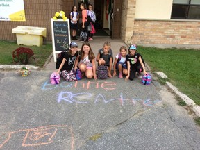 Ste-Therese students receive a great welcome back greeting from school staff. Supplied photo