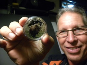 Ernst Kuglin/The Intelligencer
Quinte West artist Doug Comeau, owner of the Timberwolf Gallery, north of Frankford, revealed a secret this week. He was contracted by the Royal Canadian Mint to submit a design for a new $20 silver collector coin. The mint released the coin featuring a Bison on Tuesday. In 2013, Comeau won a nation-wide competition to submit a design for a similar collector's piece.