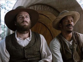 This image provided by the Sundance Institute shows, Armie Hammer, left, and Nate Parker, in a scene from the film, "The Birth of a Nation." (Handout photo)